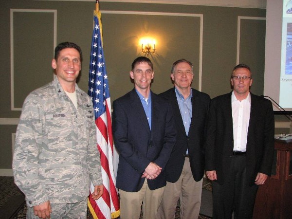 Joining together at the April luncheon are (l-r) Col. Donovan L. Routsis, chapter president; Daniel G. Ramaekers, vice president of information technology, Tenaska;  Phillip Narducci, manager of IT infrastructure support, Tenaska; and Brian Schaben, director of IT infrastructure and operations, Black Hills Corporation. Each panelists received a chapter coin for their participation.